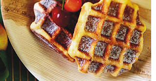 wooden plates with waffles on them